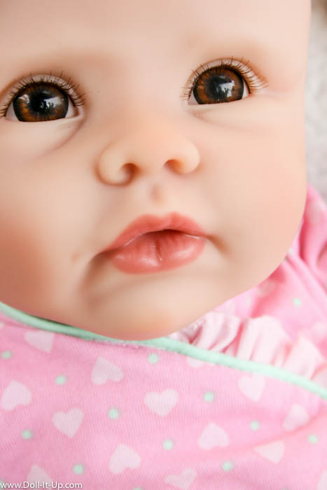 lifelike baby dolls with eyes that open and close